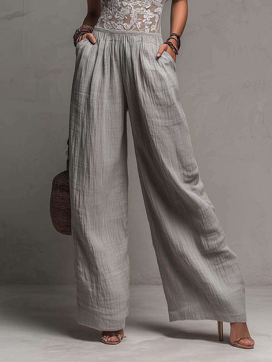Mono bohemio gris de pierna ancha plisado con ribete de encaje